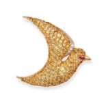A YELLOW SAPPHIRE, DIAMOND AND RUBY BIRD BROOCH in 18ct yellow gold, designed as a bird in flight...
