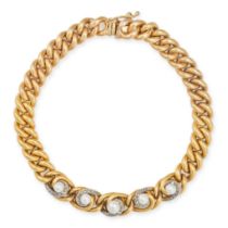 AN ANTIQUE PEARL AND DIAMOND CURB BRACELET in yellow gold, the central five links set with pearls...