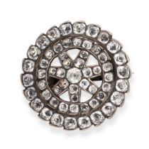 AN ANTIQUE BLACK DOT PASTE BROOCH in silver, in circular form, set throughout with black dot past...