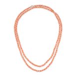A CORAL AND GLASS BEAD NECKLACE in 9ct yellow gold, comprising a row of polished coral beads acce...