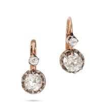 A PAIR OF ANTIQUE DIAMOND EARRINGS in yellow gold, each set with an old cut diamond suspending a ...