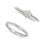 TIFFANY & CO., A SOLITAIRE DIAMOND ENGAGEMENT RING in platinum, set with a round brilliant cut di...