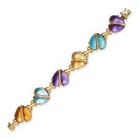 A GEMSET HEART BRACELET in 18ct yellow gold, designed as a row of hearts set with pear shaped cab...