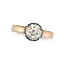 A SOLITAIRE DIAMOND RING in yellow gold and silver, set with an old cut diamond of 1.64 carats in...