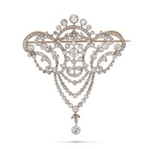 A FINE ANTIQUE EDWARDIAN DIAMOND DEVANT DE CORSAGE BROOCH in platinum and yellow gold, in a scrol...