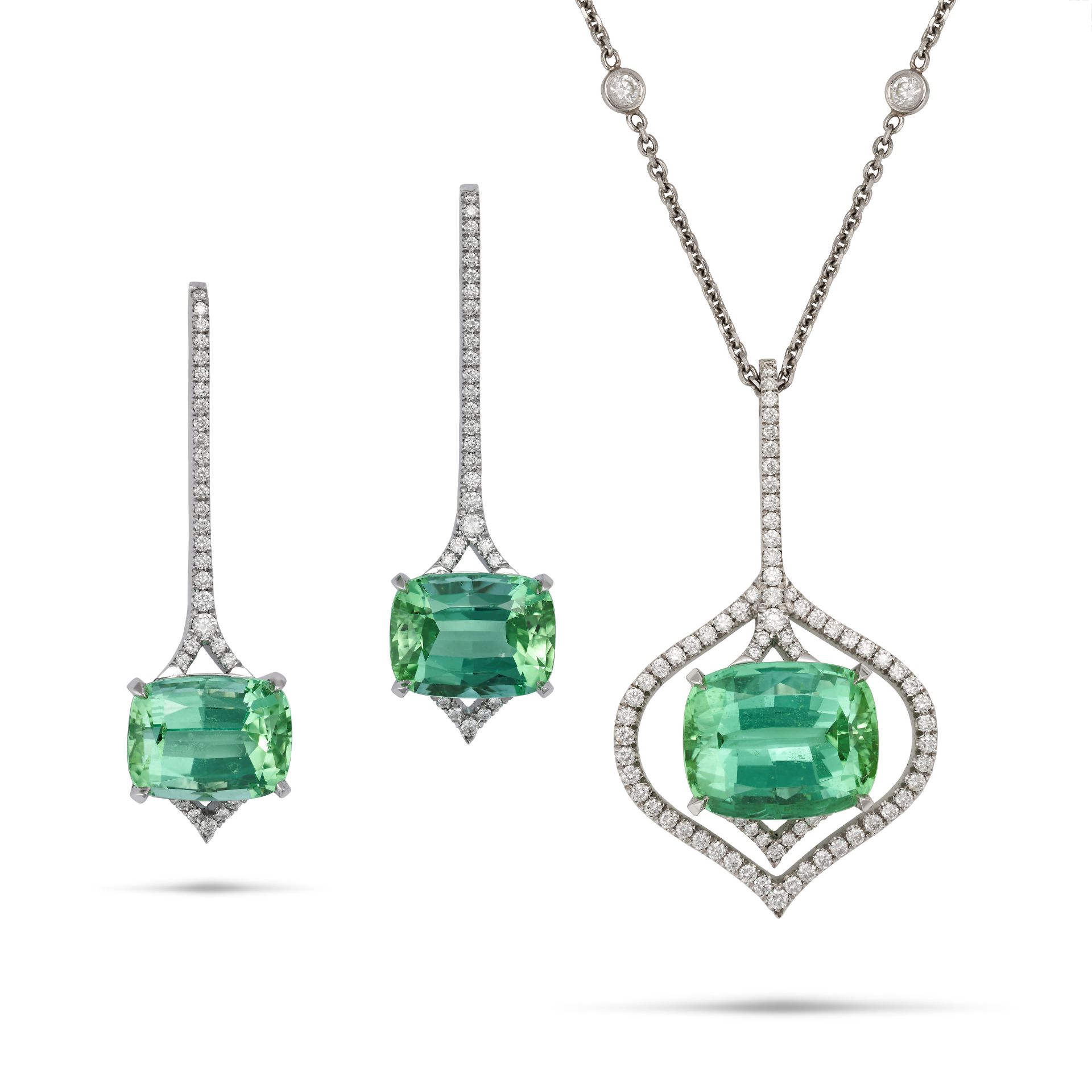 BOODLES, A GREEN TOURMALINE AND DIAMOND EARRINGS NECKLACE SUITE in platinum, the pendant set with...