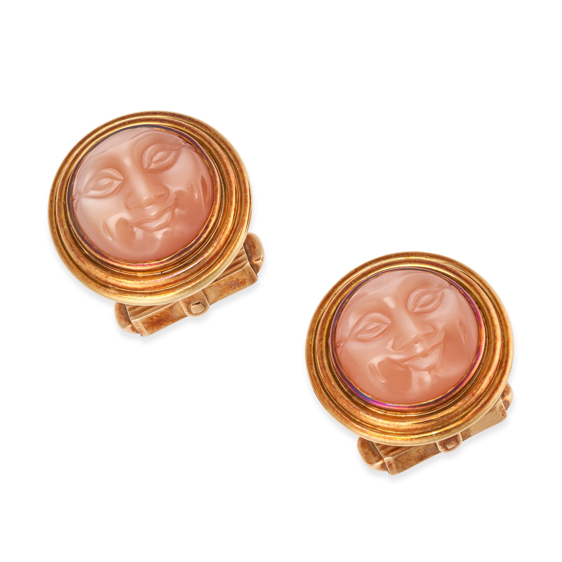 A PAIR OF ORANGE MOONSTONE MAN IN THE MOON CUFFLINKS in 18ct yellow gold, each circular face set ...