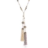 A FINE FRENCH GEMSET NATURAL PEARL TASSEL NECKLACE in yellow gold, the chain set with pearls and ...