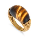 A TIGER'S EYE DRESS RING in yellow gold, set with an oval cabochon tiger's eye, no assay marks, s...