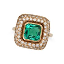 A COLOMBIAN EMERALD AND DIAMOND RING in 18ct yellow gold, set with an octagonal step cut emerald ...