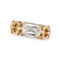 A DIAMOND RING in yellow gold, set with a Crisscut diamond of approximately 2.95 carats on a fanc...