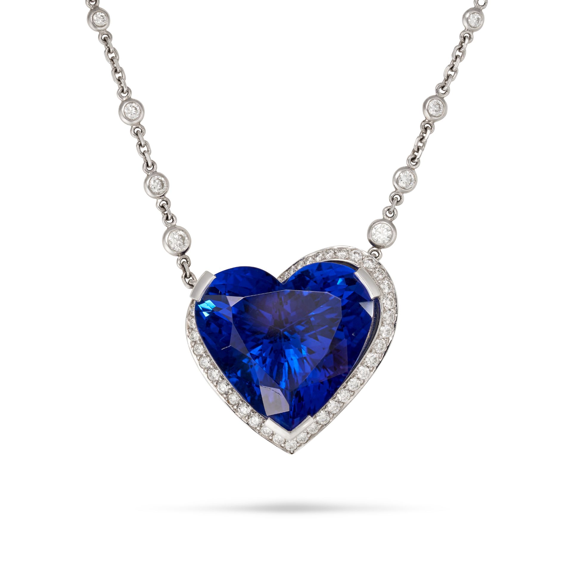 BOODLES, A TANZANITE AND DIAMOND PENDANT NECKLACE in platinum, set with a heart shaped tanzanite ...