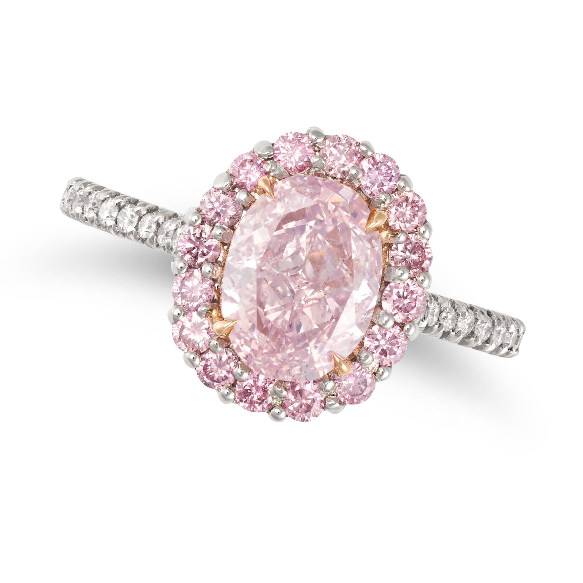 AN IMPORTANT FANCY PURPLISH PINK DIAMOND RING in platinum and 18ct white gold, set with an oval c...
