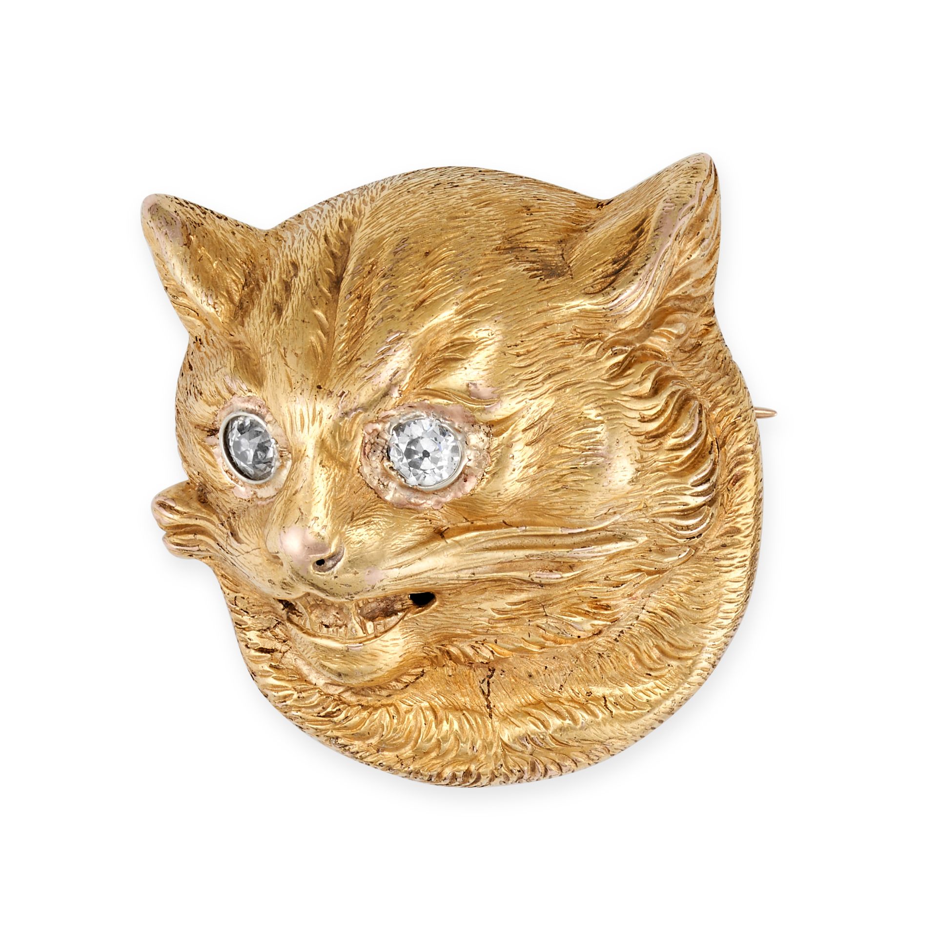 AN ANTIQUE DIAMOND CAT BROOCH in yellow gold, designed as the head of a cat, the eyes set with ol...