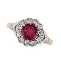 AN UNHEATED RUBY AND DIAMOND CLUSTER RING in 18ct yellow gold and platinum, set with a round cut ...