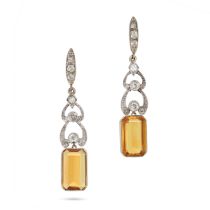A PAIR OF YELLOW SAPPHIRE AND DIAMOND DROP EARRINGS in white gold, comprising a row of links set ...