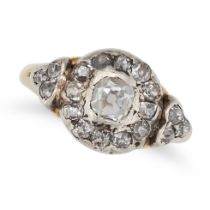 AN ANTIQUE DIAMOND CLUSTER RING in yellow gold and silver, set with a cluster of old cut diamonds...