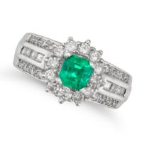 AN EMERALD AND DIAMOND CLUSTER RING in platinum, set with an octagonal step cut emerald of 0.63 c...