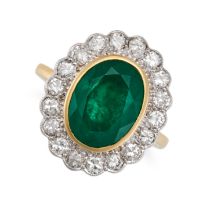 AN EMERALD AND DIAMOND CLUSTER RING in 18ct yellow gold, set with an oval cut emerald of 4.03 car...
