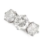 A FINE DIAMOND THREE STONE RING in platinum, set with three round brilliant cut diamonds, the dia...