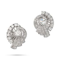 A PAIR OF DIAMOND EARRINGS in platinum, each set with an old European cut diamond of approximatel...