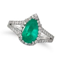 AN EMERALD AND DIAMOND RING in 14ct white gold, set with a pear cut emerald of 2.10 carats, in a ...