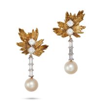 A PAIR OF DIAMOND AND PEARL DAY AND NIGHT DROP EARRINGS in 18ct yellow gold, the foliate style ea...