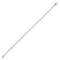 A DIAMOND LINE BRACELET in 18ct white gold, comprising a row of round brilliant cut diamonds, the...