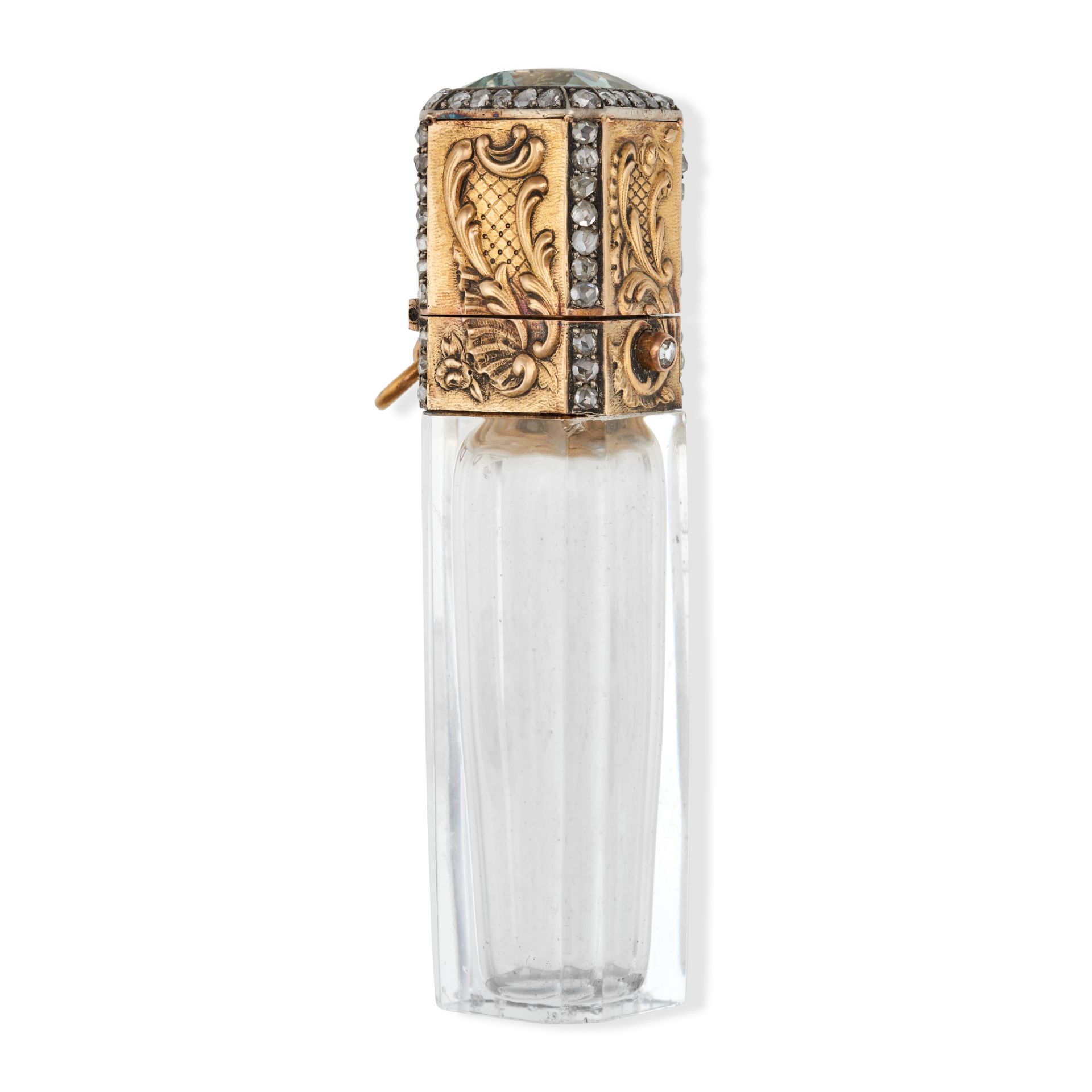 AN ANTIQUE DIAMOND AND AQUAMARINE SCENT BOTTLE in yellow gold, the glass bottle topped with a gol...
