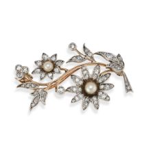 A DIAMOND AND PEAL SPRAY BROOCH in yellow gold, designed as a spray of foliage set throughout wit...