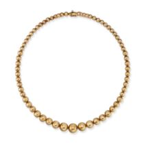 A GOLD BEAD NECKLACE in 9ct yellow gold, comprising a single row of graduating gold beads, London...