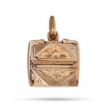 AN ANTIQUE FOLDING LOCKET PENDANT in 9ct yellow gold, the hinged geometric engraved locket openin...