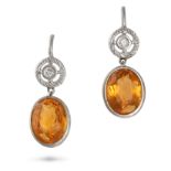 A PAIR OF CITRINE AND DIAMOND DROP EARRINGS in white gold and platinum, each earring set with an ...