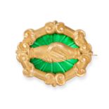 AN ANTIQUE ENAMEL FEDE BROOCH in yellow gold, designed as two clasped hands over a green enamel b...