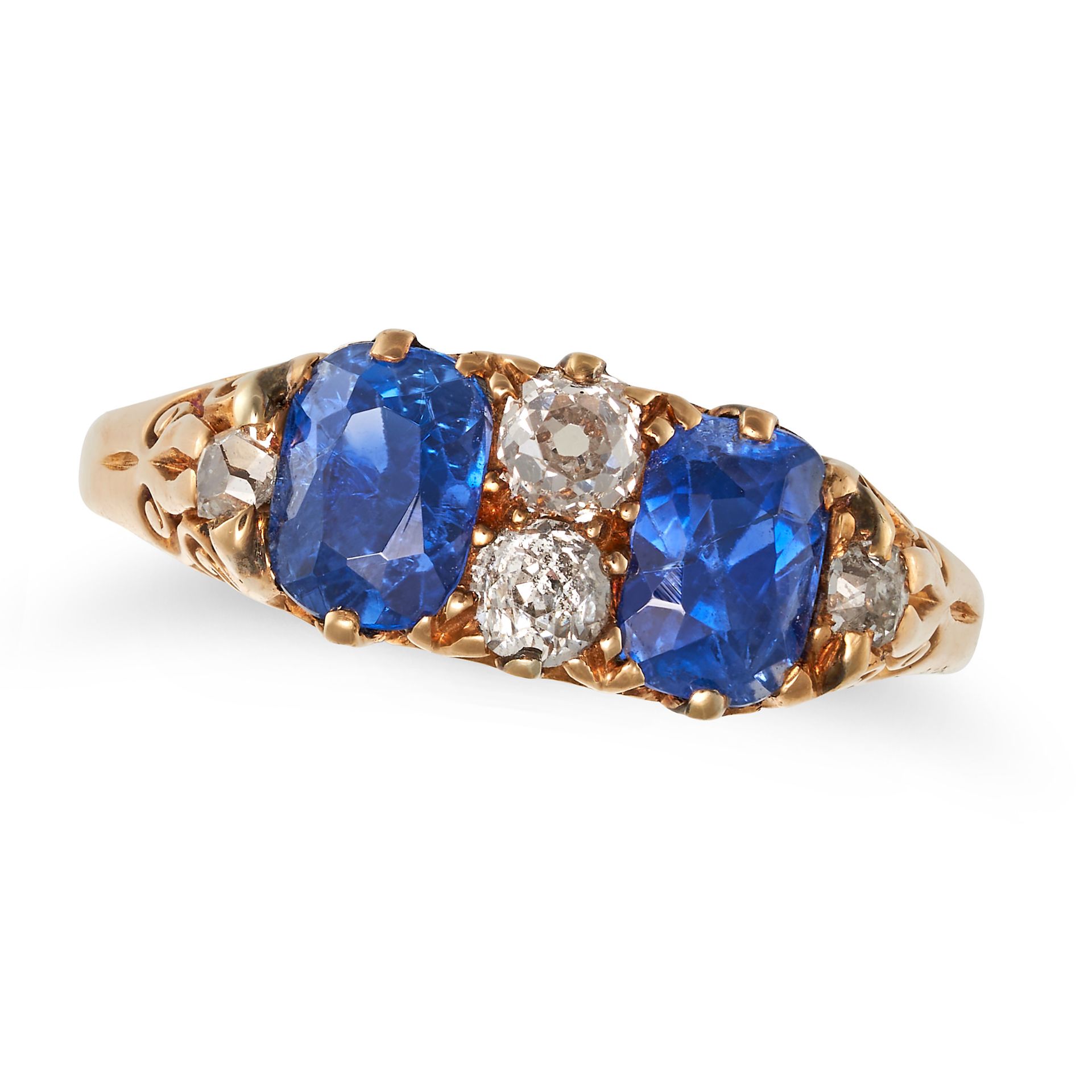 AN ANTIQUE CEYLON NO HEAT SAPPHIRE AND DIAMOND RING in 18ct yellow gold, set with two cushion cut...
