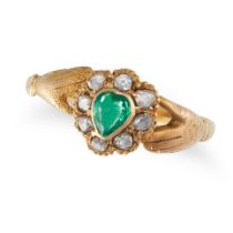 AN ANTIQUE EMERALD AND DIAMOND CLADDAGH RING in yellow gold, set with a pear cut emerald in a clu...