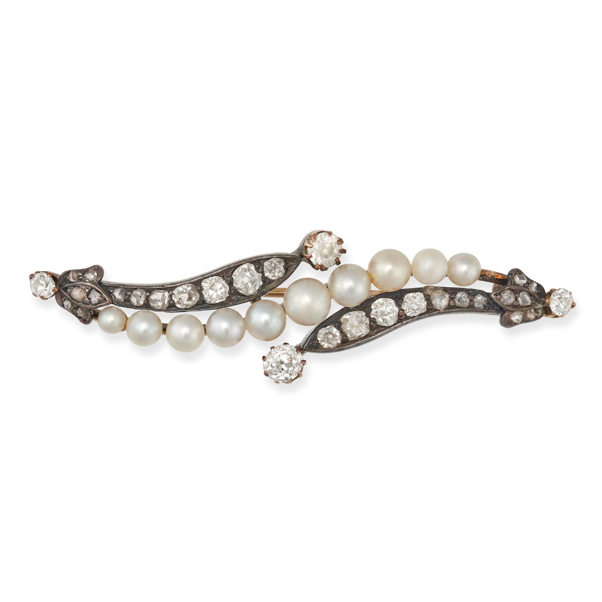 NO RESERVE - AN ANTIQUE PEARL AND DIAMOND BROOCH in yellow gold and silver, the scrolling brooch ...