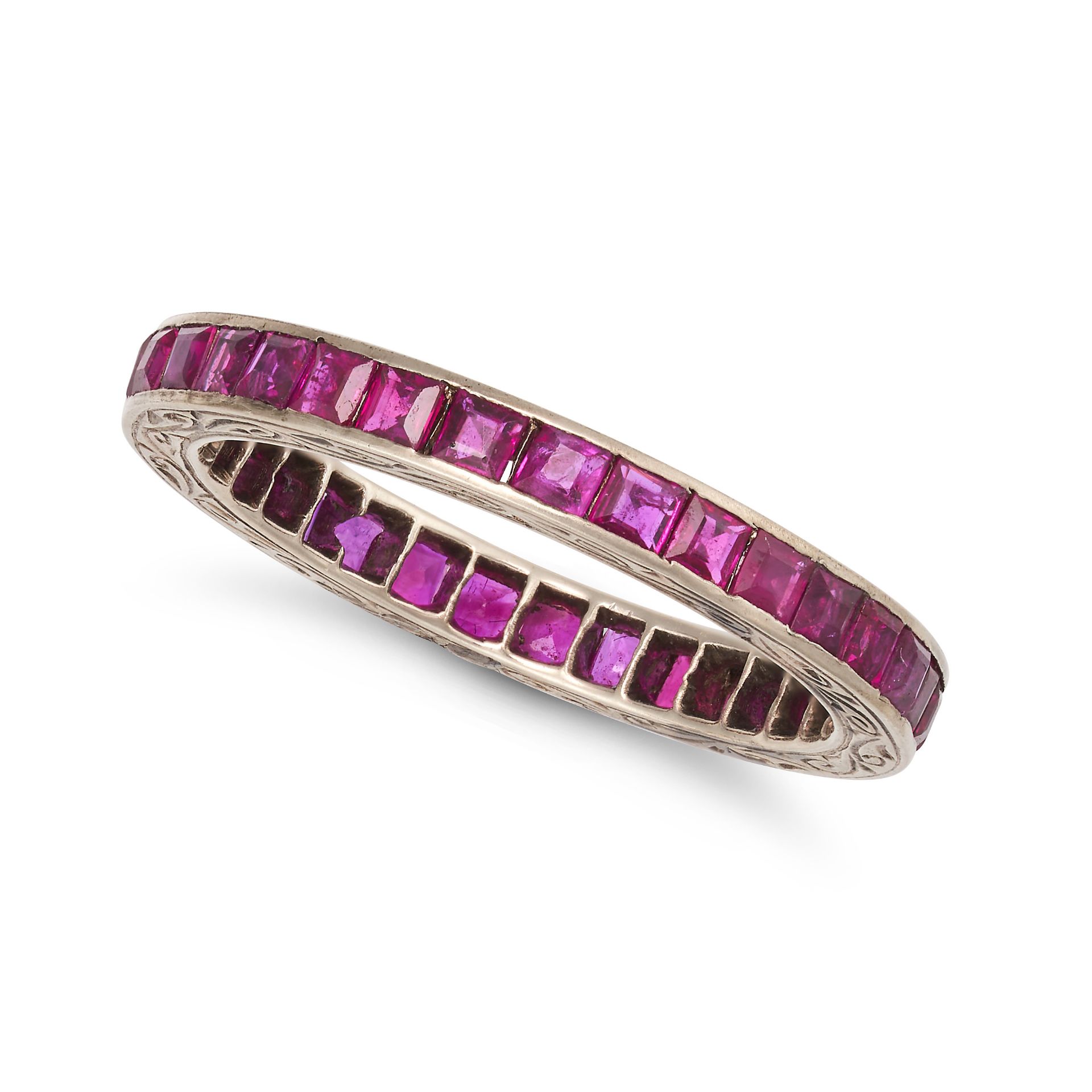 A RUBY ETERNITY RING set all around with a row of square step cut rubies, no assay marks, size M1...