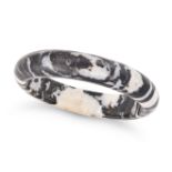 NO RESERVE - A ZEBRA JASPER BANGLE comprising a polished hoop of zebra jasper, inner circumferenc...