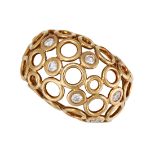 SOLANGE AZAGURY-PARTRIDGE, A DIAMOND JUMP RING in 18ct yellow gold, the openwork bombe face compr...