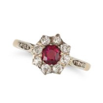 AN ANTIQUE RUBY AND DIAMOND CLUSTER RING in yellow gold and platinum, set with a cushion cut ruby...