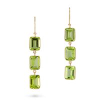 A PAIR OF PERIDOT DROP EARRINGS in 18ct yellow gold, each set with a row of three octagonal step ...