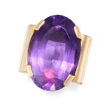 A FRENCH AMETHYST DRESS RING in 18ct yellow gold, set with an oval cut amethyst of approximately ...