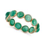 AN EMERALD ETERNITY RING in 18ct yellow gold, set all round with a row of round cabochon emeralds...