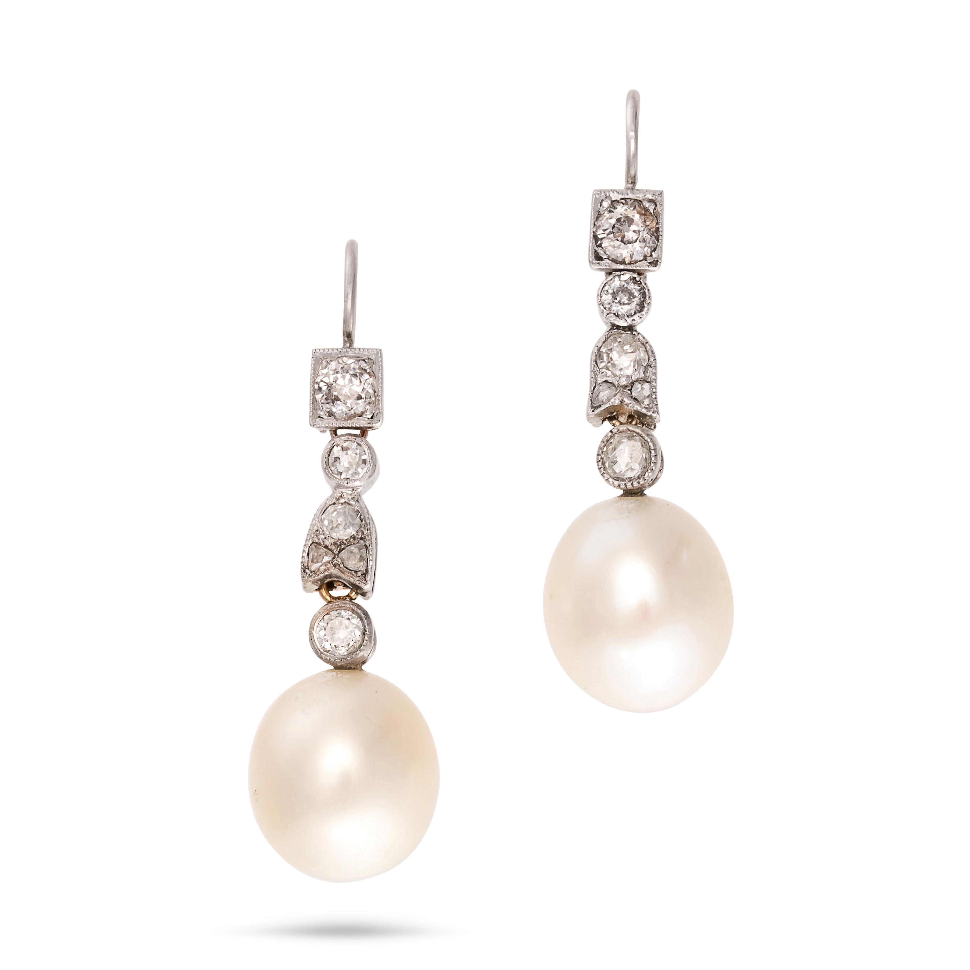 A PAIR OF DIAMOND AND PEARL DROP EARRINGS in white gold, each comprising a row of old and rose cu...