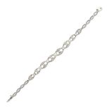 A PEARL AND DIAMOND BRACELET in white gold, set with three graduated pearls over open-work links,...