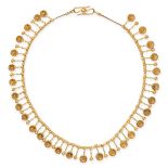 AN ANTIQUE GOLD FRINGE NECKLACE in yellow gold, comprising a row of fancy links suspending a frin...