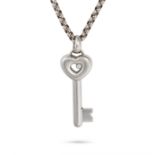 CHOPARD, A HAPPY DIAMOND KEY PENDANT NECKLACE in 18ct white gold, the pendant designed as a key w...