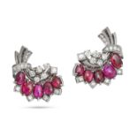 A PAIR OF VINTAGE RUBY AND DIAMOND CLIP EARRINGS in platinum, each in a scrolling foliate design ...