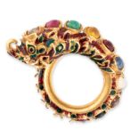A GEMSET AND ENAMEL DRAGON RING in high carat yellow gold, designed as a coiled dragon relieved i...